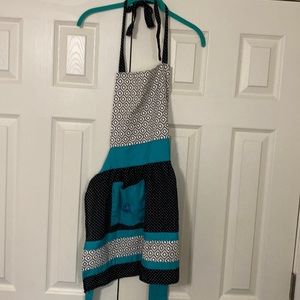 Turquoise, black, and white apron
